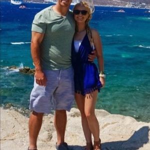 Lulu’s blue halter romper with tassel shorts XS